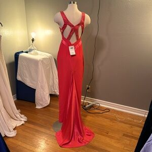 Sold crosslisted sold crosslisted sold crosslisted
Pink formal gown with rhines